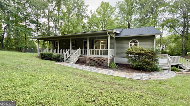 253 Yonah Valley Rd, Cleveland, GA 30528 - ranch-style home featuring a porch, a front yard, and a shingled roof
