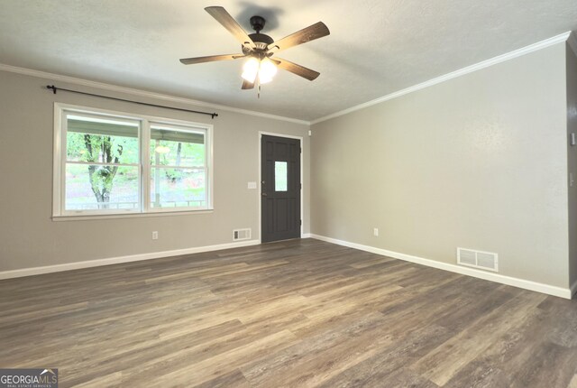 253 Yonah Valley Rd, Cleveland, GA 30528 - foyer entrance featuring dark wood-style flooring, ceiling fan, ornamental molding, and baseboards