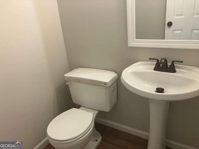 7593 Watson Bay Ct, Stone Mountain, GA 30087 - bathroom featuring toilet and wood finished floors
