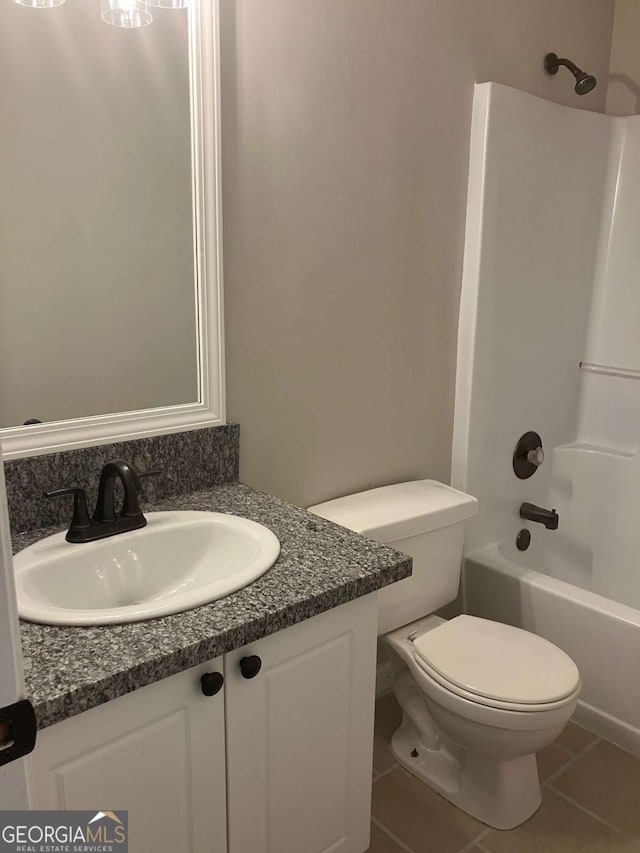 7593 Watson Bay Ct, Stone Mountain, GA 30087 - bathroom featuring vanity, tile patterned flooring, and shower / bath combination