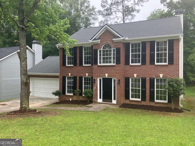 7593 Watson Bay Ct, Stone Mountain, GA 30087 - colonial inspired home with a garage, a front yard, concrete driveway, and brick siding
