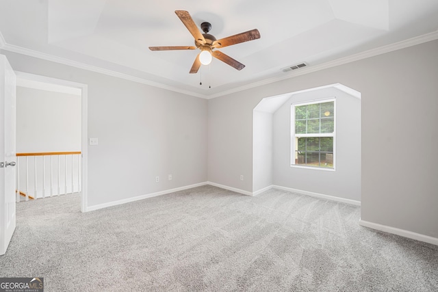 5057 Lower Elm St, Atlanta, GA 30349 - carpeted spare room with a raised ceiling, ceiling fan, ornamental molding, and baseboards
