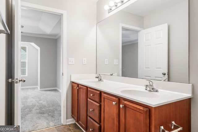 5057 Lower Elm St, Atlanta, GA 30349 - full bath featuring crown molding, double vanity, baseboards, and tile patterned flooring