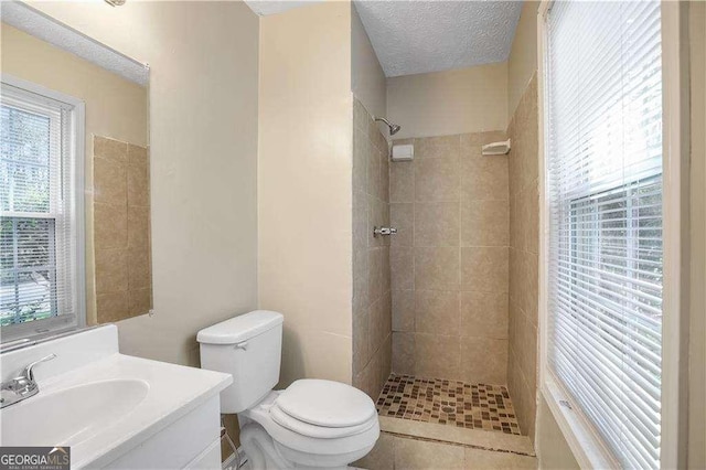 5422 Timor Trl, Lithonia, GA 30038 - full bathroom with toilet, a tile shower, and vanity
