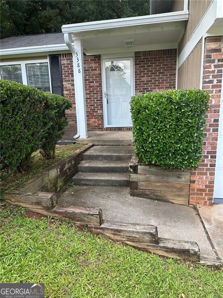 5388 Robertson Path, Lithonia, GA 30038 - property entrance featuring brick siding