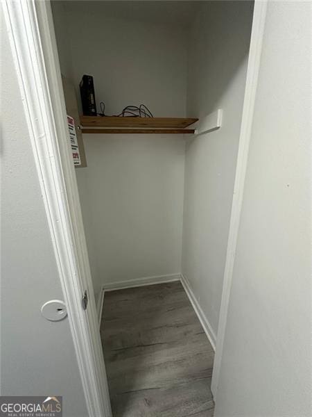 5388 Robertson Path, Lithonia, GA 30038 - walk in closet with wood finished floors