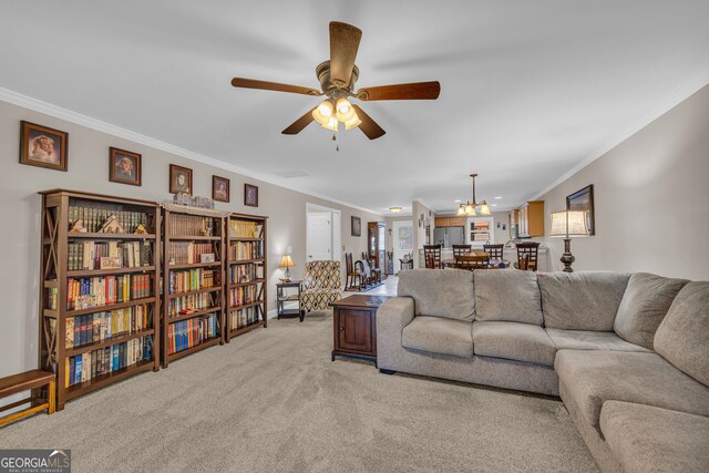 26-105 Midway Street Unit #108But Door #105, Helen, GA 30545 - living room featuring ornamental molding, a ceiling fan, light carpet, a chandelier, and baseboards
