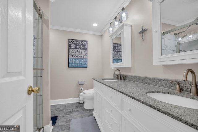 26-105 Midway Street Unit #108But Door #105, Helen, GA 30545 - bathroom with double vanity, a shower with door, toilet, baseboards, and ornamental molding