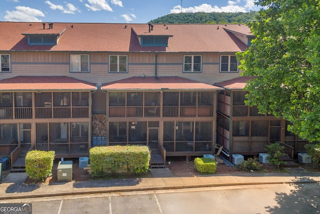 26-105 Midway Street Unit #108But Door #105, Helen, GA 30545 - back of property with a sunroom and cooling unit