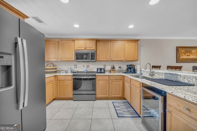 26-105 Midway Street Unit #108But Door #105, Helen, GA 30545 - kitchen with stainless steel appliances, beverage cooler, a sink, ornamental molding, and light stone countertops
