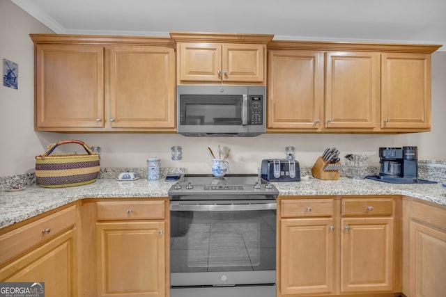 26-105 Midway Street Unit #108But Door #105, Helen, GA 30545 - kitchen featuring appliances with stainless steel finishes and light stone countertops