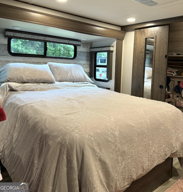 279 Leisure Acres Dr, Cleveland, GA 30528 - bedroom featuring recessed lighting and wood walls