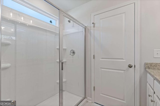 688 Shoals Trl, Dallas, GA 30132 - full bathroom featuring a shower stall and vanity