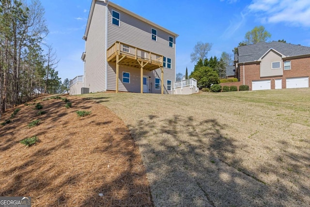 688 Shoals Trl, Dallas, GA 30132 - back of property with a deck, cooling unit, and a yard