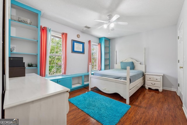 1093 Forest View Ln SW, Lilburn, GA 30047 - bedroom featuring dark wood-type flooring, ceiling fan, and baseboards