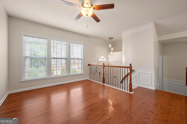 1379 Thornborough Dr, Alpharetta, GA 30004 - unfurnished living room with stairway, wood finished floors, baseboards, and a chandelier