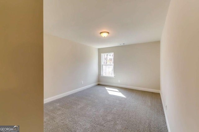 407 Shoals Trl, Dallas, GA 30132 - unfurnished room with carpet and baseboards