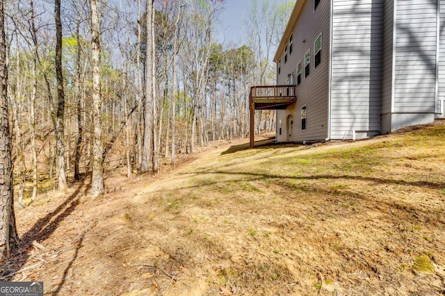 407 Shoals Trl, Dallas, GA 30132 - view of green lawn featuring a wooden deck