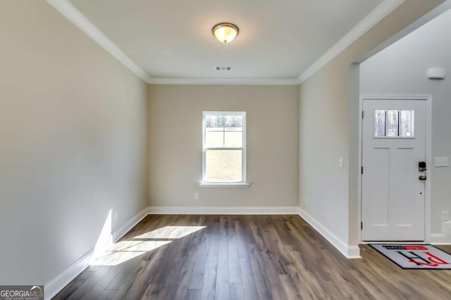 407 Shoals Trl, Dallas, GA 30132 - foyer entrance with crown molding, wood finished floors, and baseboards