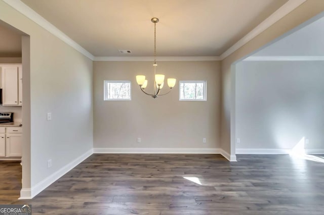 407 Shoals Trl, Dallas, GA 30132 - unfurnished dining area with a chandelier, crown molding, dark wood-style flooring, and baseboards