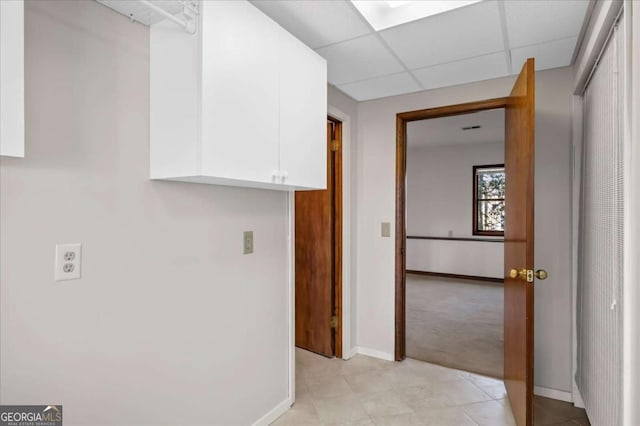 3966 N Indian Cir NW, Kennesaw, GA 30144 - corridor with light carpet, a paneled ceiling, and light tile patterned flooring