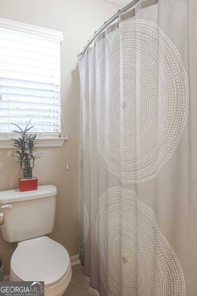 521 Lake Jordan Blvd W, Kingsland, GA 31548 - bathroom featuring tile patterned floors and curtained shower