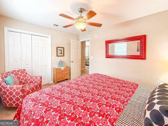 521 Lake Jordan Blvd W, Kingsland, GA 31548 - bedroom with carpet floors, a closet, and a ceiling fan