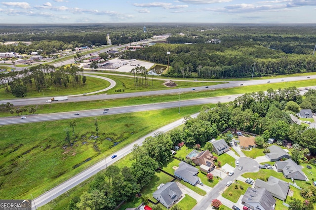 521 Lake Jordan Blvd W, Kingsland, GA 31548 - aerial view of residential area with a forest