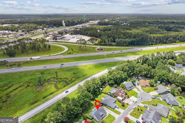 521 Lake Jordan Blvd W, Kingsland, GA 31548 - aerial view of property and surrounding area with nearby suburban area and a main thoroughfare