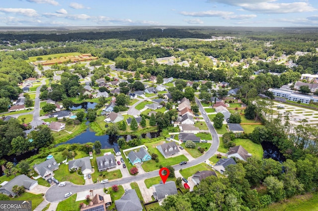 521 Lake Jordan Blvd W, Kingsland, GA 31548 - aerial view of property's location featuring nearby suburban area and a heavily wooded area