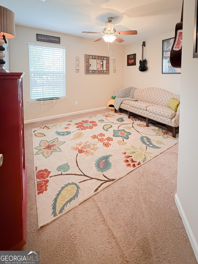 521 Lake Jordan Blvd W, Kingsland, GA 31548 - living room with carpet floors and ceiling fan