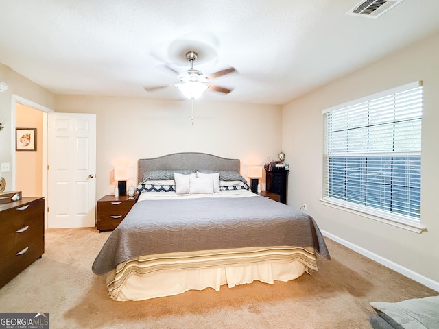 521 Lake Jordan Blvd W, Kingsland, GA 31548 - bedroom with light colored carpet and ceiling fan
