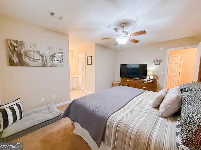 521 Lake Jordan Blvd W, Kingsland, GA 31548 - bedroom featuring light colored carpet, a ceiling fan, and ensuite bathroom