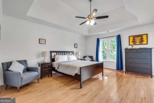 3250 Cobbs Farm Trl NW, Marietta, GA 30064 - bedroom with a tray ceiling, light wood-type flooring, crown molding, and a ceiling fan