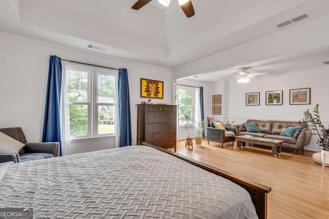 3250 Cobbs Farm Trl NW, Marietta, GA 30064 - bedroom with wood finished floors, a raised ceiling, ornamental molding, and a ceiling fan