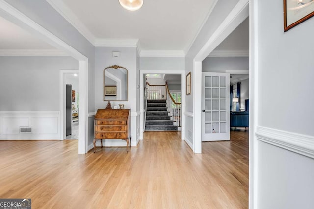3250 Cobbs Farm Trl NW, Marietta, GA 30064 - entrance foyer featuring stairs, light wood-type flooring, crown molding, and french doors