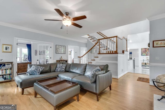 3250 Cobbs Farm Trl NW, Marietta, GA 30064 - living room with a ceiling fan, stairs, light wood finished floors, and crown molding