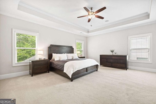 1596 Fearn Cir NE, Brookhaven, GA 30319 - bedroom featuring a raised ceiling, crown molding, carpet, baseboards, and ceiling fan