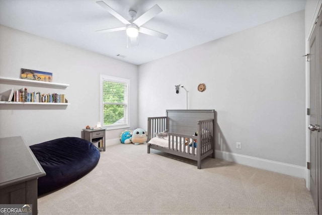 1596 Fearn Cir NE, Brookhaven, GA 30319 - carpeted bedroom with baseboards and ceiling fan