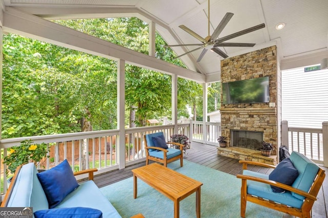 1596 Fearn Cir NE, Brookhaven, GA 30319 - sunroom / solarium with a ceiling fan, an outdoor living space with a fireplace, and lofted ceiling