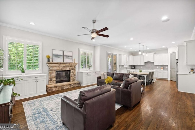 1596 Fearn Cir NE, Brookhaven, GA 30319 - living room with plenty of natural light, ceiling fan, crown molding, recessed lighting, and a fireplace