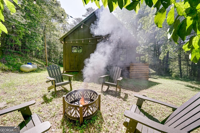 81 Falcon Cir Unit 2, Ellijay, GA 30540 - view of yard featuring a fire pit