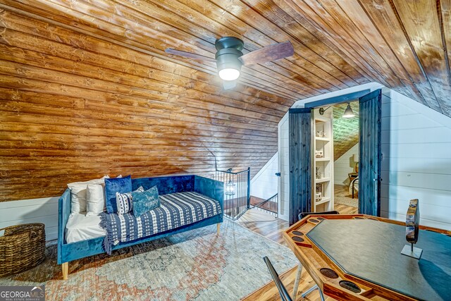 81 Falcon Cir Unit 2, Ellijay, GA 30540 - bedroom with wood ceiling, wooden walls, wood finished floors, lofted ceiling, and ceiling fan