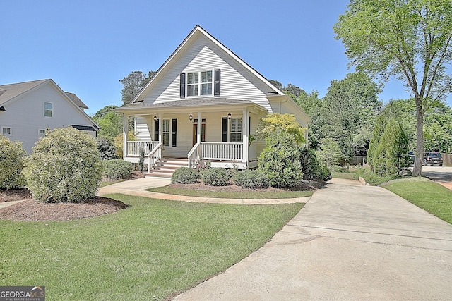 46 Horseshoe Bend Way, Senoia, GA 30276 - view of front facade featuring covered porch and a front lawn