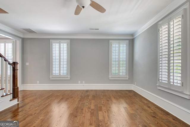 46 Horseshoe Bend Way, Senoia, GA 30276 - spare room with stairs, a ceiling fan, wood finished floors, ornamental molding, and baseboards