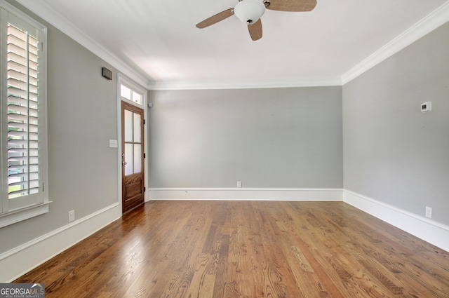 46 Horseshoe Bend Way, Senoia, GA 30276 - spare room featuring a ceiling fan, ornamental molding, wood finished floors, and baseboards