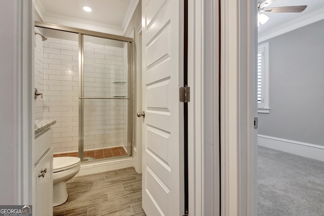 46 Horseshoe Bend Way, Senoia, GA 30276 - bathroom featuring ornamental molding, toilet, a shower stall, ceiling fan, and vanity