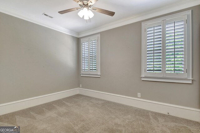 46 Horseshoe Bend Way, Senoia, GA 30276 - spare room featuring carpet flooring, crown molding, ceiling fan, and baseboards