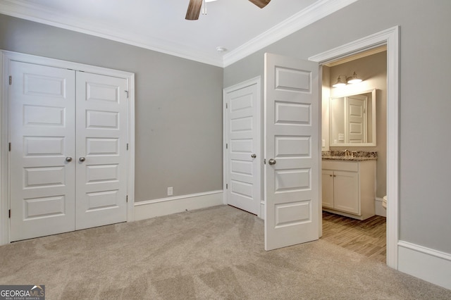46 Horseshoe Bend Way, Senoia, GA 30276 - unfurnished bedroom with carpet flooring, ornamental molding, connected bathroom, a closet, and a ceiling fan