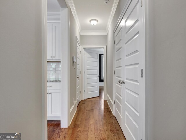 46 Horseshoe Bend Way, Senoia, GA 30276 - hallway featuring ornamental molding and wood finished floors